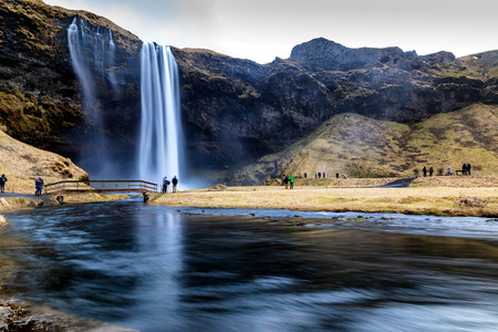 Vik, Iceland - March 25, 2017: Famous Seljalandsfoss is one of the most beautiful waterfalls on the Iceland. It is located on the South of the island. Long exposureのeditorial素材