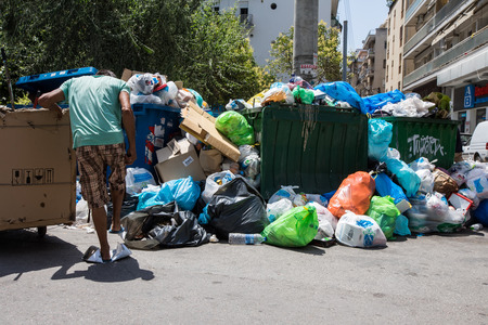 Thessaloniki, Greece - June 28, 2017: The streets of Thessaloniki are filled with rubbish due to workers' strike in garbage collectionのeditorial素材