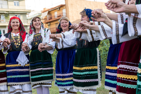Thessaloniki, Greece - Sept  21, 2017: Group performing Greek folklore dance during the harvest seasonのeditorial素材