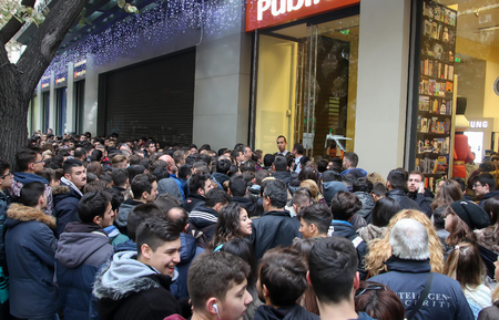 Thessaloniki, Greece - November 25, 2016. People wait outside a department store during Black Friday shopping deals, at the northern Greek city of Thessaloniki.のeditorial素材