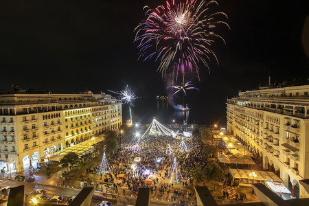 Thessaloniki, Greece -January 1, 2017:  General view in Aristotle's square in Thessaloniki  during New Year celebrations with fantastic multi-colored fireworks, on the night skyのeditorial素材