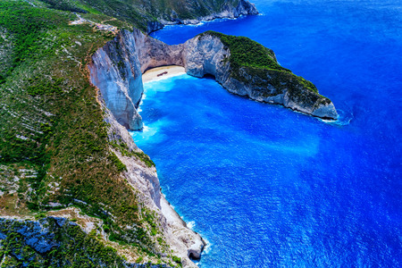 Aerial view of Navagio (Shipwreck) Beach in Zakynthos island, Greece. Navagio Beach is a popular attraction among tourists visiting the island of Zakynthos. The best beaches in the worldの写真素材