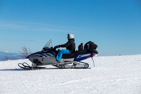 Vasilitsa, Greece - January 5, 2018: Skiers enjoy the snow at Ski Resort Vasilitsa in the mountain range of Pindos, in Greece. The ski resorts currently has 5 lifts and 16 ski trailsのeditorial素材
