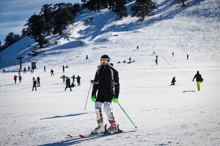 Vasilitsa, Greece - January 5, 2018: Skiers enjoy the snow at Ski Resort Vasilitsa in the mountain range of Pindos, in Greece. The ski resorts currently has 5 lifts and 16 ski trailsのeditorial素材