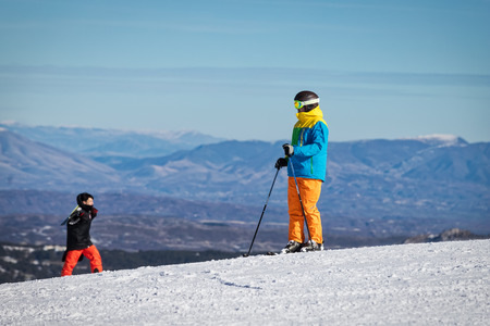 Vasilitsa, Greece - January 5, 2018: Skiers enjoy the snow at Ski Resort Vasilitsa in the mountain range of Pindos, in Greece. The ski resorts currently has 5 lifts and 16 ski trailsのeditorial素材