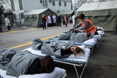 Thessaloniki, Greece - Feb 16, 2018: patients have been transferred to an open-air hospital during an earthquake training session at the AXEPA hospitalのeditorial素材