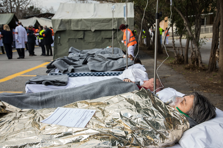 Thessaloniki, Greece - Feb 16, 2018: patients have been transferred to an open-air hospital during an earthquake training session at the AXEPA hospitalのeditorial素材