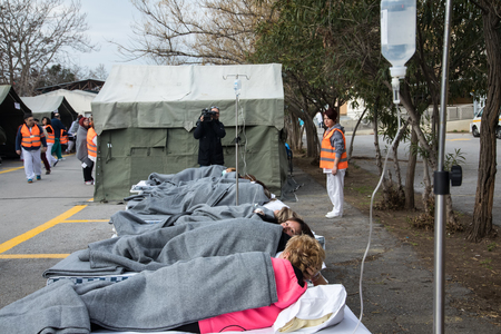 Thessaloniki, Greece - Feb 16, 2018: patients have been transferred to an open-air hospital during an earthquake training session at the AXEPA hospitalのeditorial素材