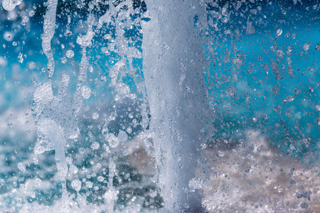 The gush of water of a fountain. Splash of water in the fountain, abstract imageの写真素材