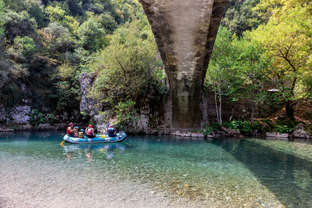 Zagori, Epirus, Greece - August 20, 2017: Adventure team doing rafting on the cold waters of the Voidomatis River in Zagori. Voidomatis river is one of the most popular among rafters in Greeceのeditorial素材