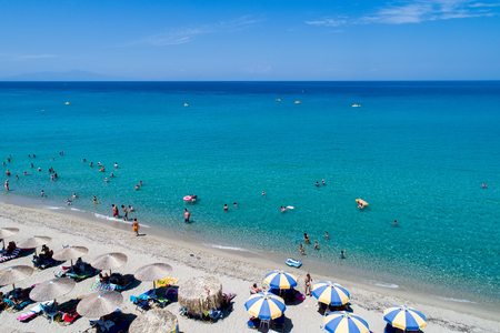 Posidi, Chalkidiki, Greece - July, 26 2017: Aerial view of the beautiful Aigeopelagitika beach in the Posidi of Chalkidiki,Greece. Visit the summer hundreds of tourists daily from the Balkans and from Europeのeditorial素材