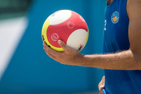 Thessaloniki - Greece June 8, 2018: Close-up on a hand holding the volley ball during the Hellenic championship Beach Volley Masters 2018 at Aristotelous squareのeditorial素材