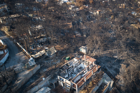 Mati, Athens - July 26, 2018: Aerial view shows a burnt area following a wildfire in the village of...