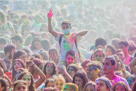Thessaloniki, Greece - September 2, 2018: Crowds of unidentified people throw colour powder during the "Day of Colours" annual event.のeditorial素材