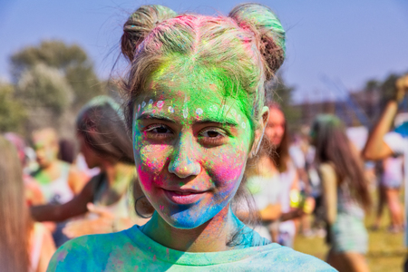 Thessaloniki, Greece - September 2, 2018: Crowds of unidentified people throw colour powder during the "Day of Colours" annual event.のeditorial素材