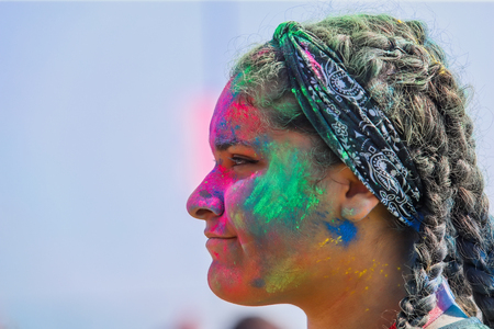 Thessaloniki, Greece - September 2, 2018: Crowds of unidentified people throw colour powder during the "Day of Colours" annual event.のeditorial素材