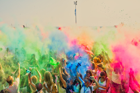 Thessaloniki, Greece - September 2, 2018: Crowds of unidentified people throw colour powder during the "Day of Colours" annual event.のeditorial素材