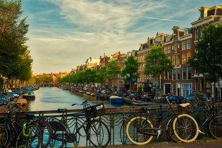Amsterdam, Netherland - July 7, 2018: Beautiful view of Amsterdam canals with bridge and typical dutch houses. Hollandのeditorial素材