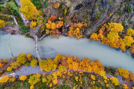 Aerial view of Konitsa old bridge and Aoos River an autumn day, Greece.の写真素材