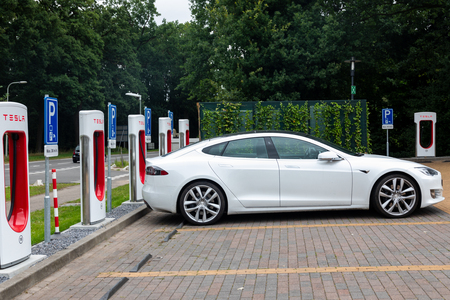 Horst, Netherlands - June 25, 2018: Tesla Super Charging station on Horst .Tesla Supercharger stations allow Tesla cars to be fast-charged at the network within an 30 minのeditorial素材
