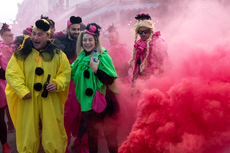 Xanthi, Greece - February 18 ,2018: People dressed in colorful costumes during the annual carnival...