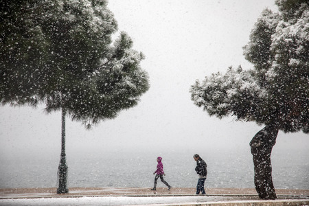 Thessaloniki, Greece - January 5, 2019: people walking in the snow in the center of the city on a winter dayのeditorial素材