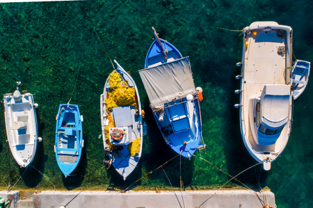 Aerial view of traditonal fishing boats in Katapola port, Amorgos island, Greeceのeditorial素材