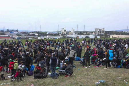 Thessaloniki, Greece - April 5, 2019: Hundreds of migrants and refugees gathered outside of a refugee camp in Diavata to walk until the Northern borders of Greece to pass to Europe.のeditorial素材