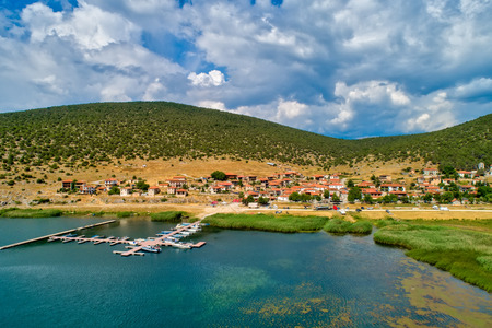aerial view of the beautiful fishing village Psarades in Prespa lake in Northern Greeceの写真素材