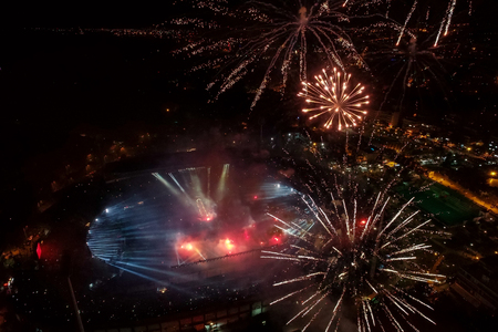 Thessaloniki, Greece, April 21, 2019: Aerial shoot of the Toumba Stadium with fireworks full of fans...