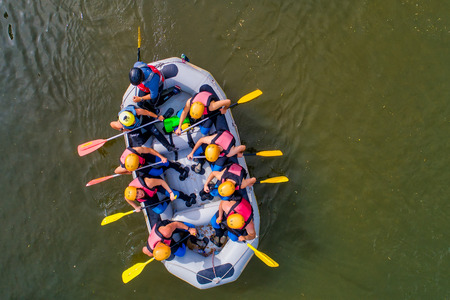 Paranesti, Drama, Greece - May 1, 2019: Aerial view of adventure team doing rafting on the cold waters of the Nestos River in Paranesti. Nestos river is one of the most popular among rafters in Greeceのeditorial素材