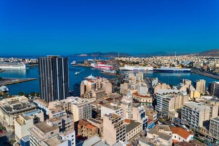 Piraeus, Greece - May 30, 2019: Aerial drone panoramic photo of Piraeus and the famous port in daylight, Attica, Greece. The port of Piraeus is the chief port in Greece, the largest passenger port in Europeのeditorial素材