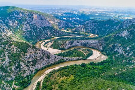 Aerial view of the river Nestos in Xanthi, Greece. The Nestos River forms on its long journey landscapes of unique beauty with rich forests, rare wetlands. favorite destination for canoe and kayakの写真素材