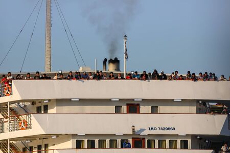 Thessaloniki, Greece â Sept 3, 2019: Refugees and migrants disembark to the port of Thessaloniki after being transfered from the refugee camp of Moria, Lesvos island.のeditorial素材