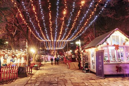 Drama, Greece - December 17 2019: The Christmas village "Oneiroupoli" in evening in Drama, northern Greece. long exposureのeditorial素材