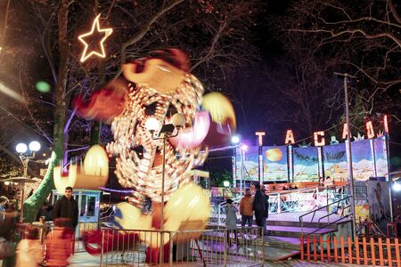 Drama, Greece - December 17 2019: The Christmas village Oneiroupoli in evening in Drama, northern...