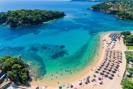 Aerial drone bird's eye view of of Agia Paraskeui Beach with turquoise sea in complex islands in Parga area, Ionian sea, Epirus, Greeceの写真素材
