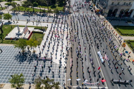 Thessaloniki, Greece â May 1, 2020: Members of the communist-affiliated trade union PAME practice social distancing during a rally commemorating May Day, following the coronavirus disease outbreakのeditorial素材