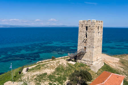 Aerial view of  byzantine tower and beach of village Nea Fokea in peninsula Kassandra Halkidiki Greeceの写真素材