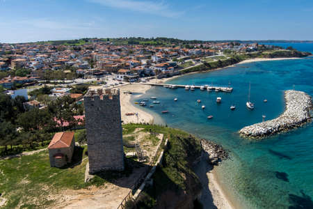 Aerial view of  byzantine tower and beach of village Nea Fokea in peninsula Kassandra Halkidiki Greeceの写真素材