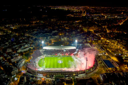 Thessaloniki, Greece, April 14, 2022: Aerial shoot of the Toumba Stadium full of fans of PAOK prior to the UEFA Europa Conference League match Paok vs Olympique de Marseille.のeditorial素材