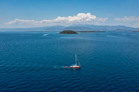 Aerial view of sailing boat in Lichadonissia island popular with boat trippers in North Evia, Greeceの写真素材