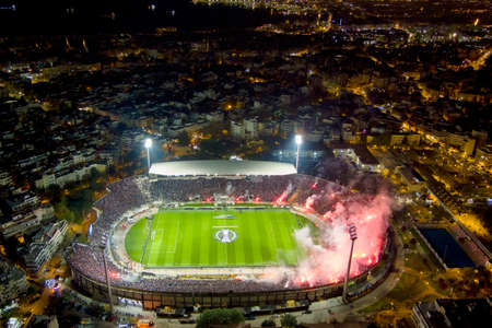 Thessaloniki, Greece, April 14, 2022: Aerial shoot of the Toumba Stadium full of fans of PAOK prior to the UEFA Europa Conference League match Paok vs Olympique de Marseille.のeditorial素材