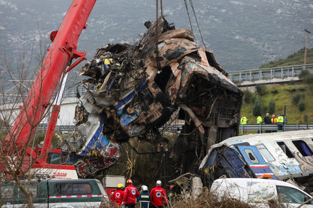 Tempi Valley, Greece - March 2, 2023: Tempi Valley, Greece - March 1, 2023: A tragic accident occurred in northern Greece, as two trains collided in the Tempi Valley. rescuers search the wreckage for survivorsのeditorial素材