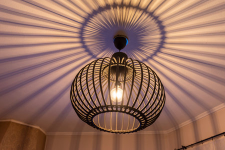 Modern handmade circular bamboo ceiling lamp. lighting bulbs for office building or home and living room decoration. Light effectの写真素材