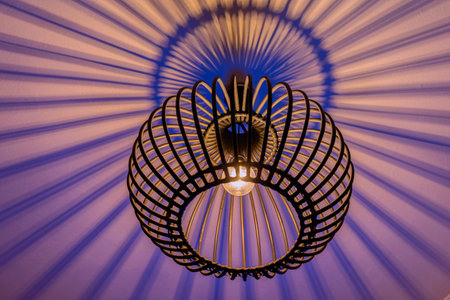 Modern handmade circular bamboo ceiling lamp. lighting bulbs for office building or home and living room decoration. Light effectの写真素材