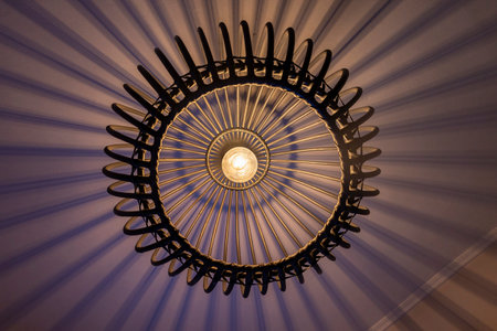 Modern handmade circular bamboo ceiling lamp. lighting bulbs for office building or home and living room decoration. Light effectの写真素材