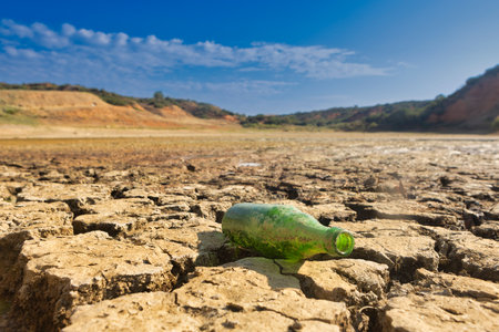 The lake at Kato Scholari, a little outside Thessaloniki, Greece, turned into a desert. The once full lake which was a habitat with many species of flora and fauna, now resembles part of a desert areaの写真素材