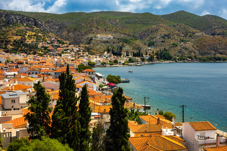 Limni, Evia, Greece â€“ Coastal village with pebbled beach, calm blue waters, traditional...