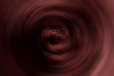 Abstract blurred background with spin circle radial motion blur in marsalaの写真素材